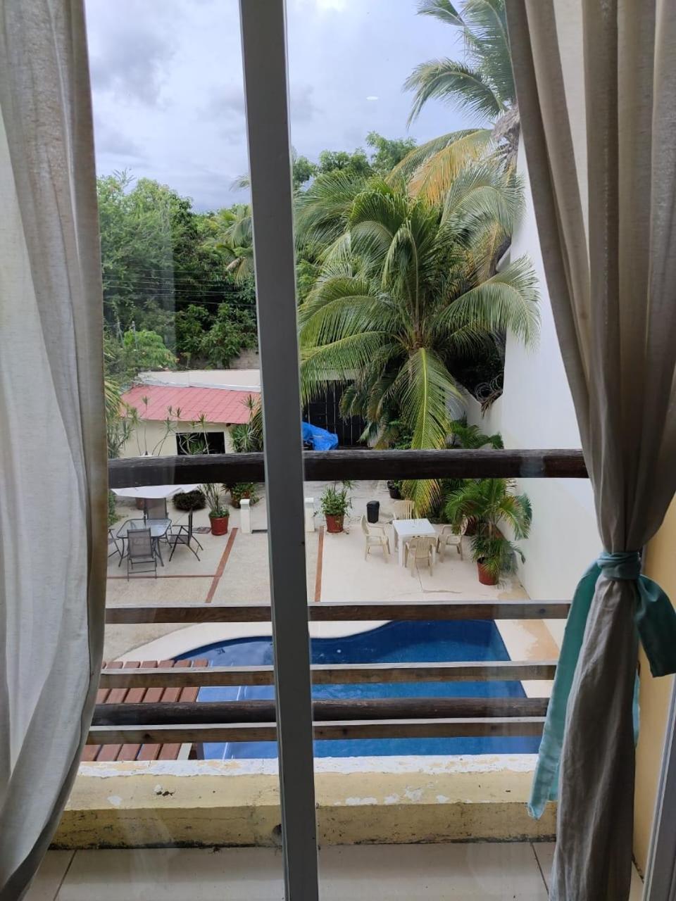 פוארטו אסקונדידו Brisamar Guesthouse מראה חיצוני תמונה