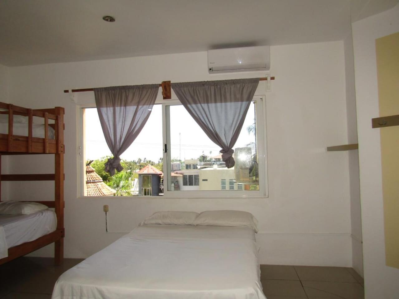 פוארטו אסקונדידו Brisamar Guesthouse מראה חיצוני תמונה